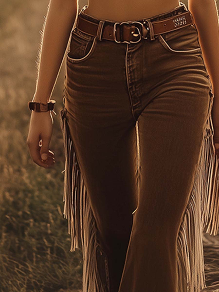 Elegant women's high waist western jeans with decorative side fringe and a fashionable flared silhouette.