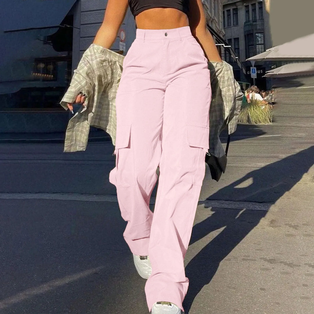 Modern women's high waist wide leg cargo trousers, combining comfort with contemporary streetwear aesthetics.