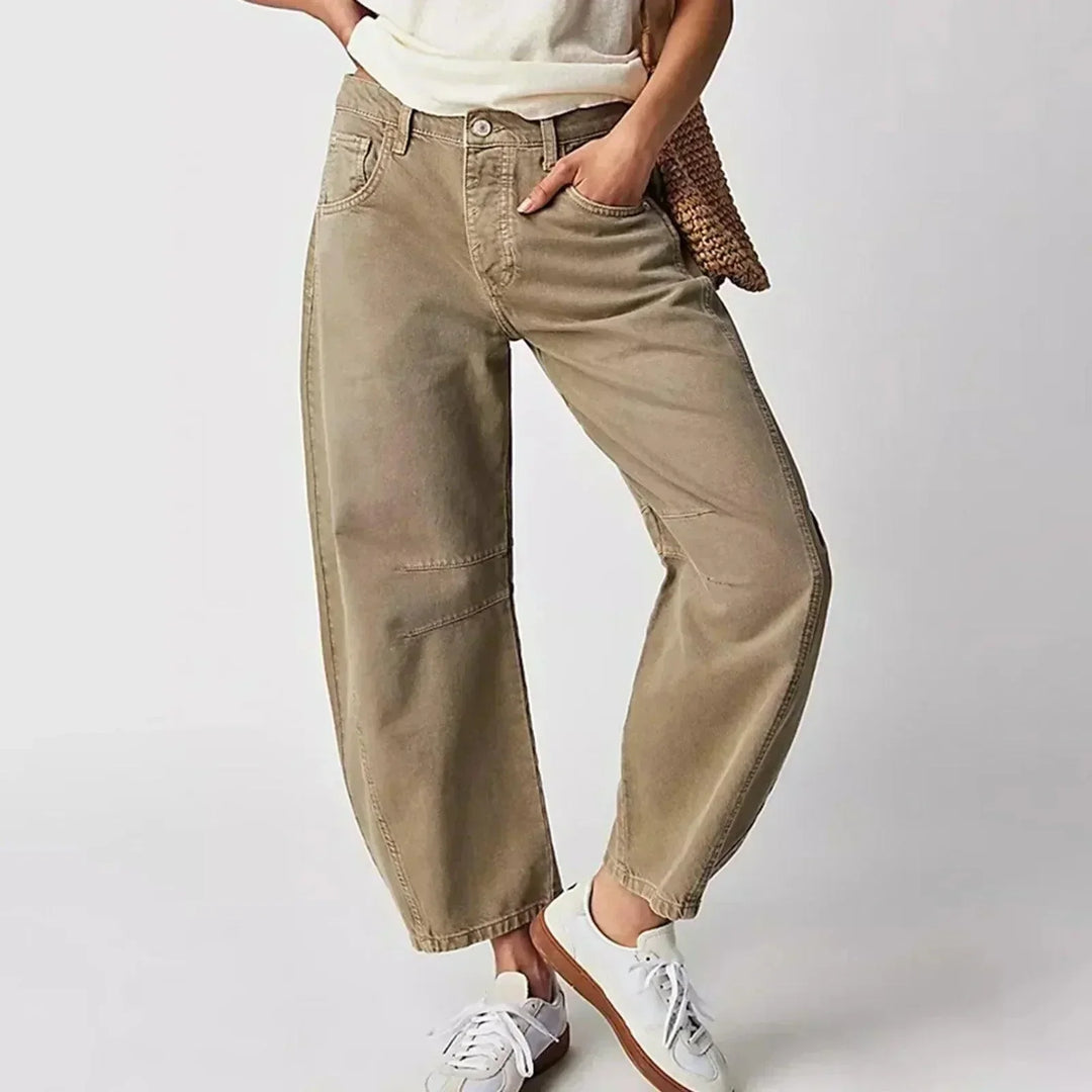 Women's high waist wide leg jeans. Relaxed fit denim for everyday comfort & style. Versatile casual wear.