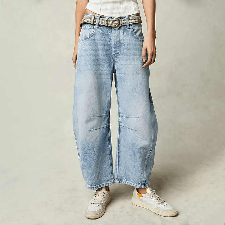 Modern women's high waist wide leg jeans. Loose, relaxed fit provides all-day comfort for casual wear.