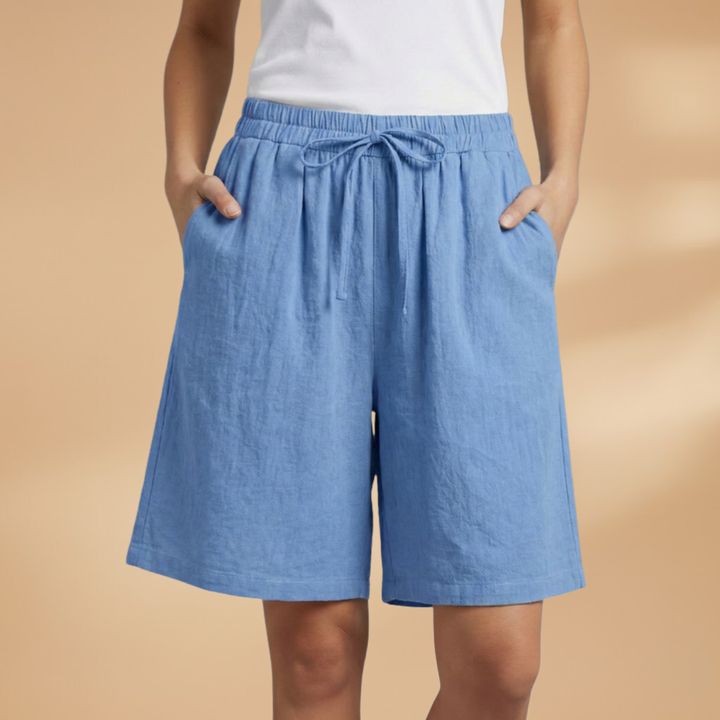 Stylish wide leg women's shorts, high waist design, with an adjustable drawstring. Resort essential.