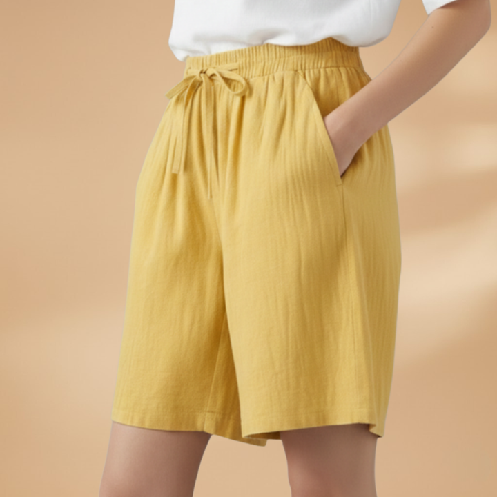 Fashionable women's shorts with a flattering high waist, wide leg, and functional drawstring.