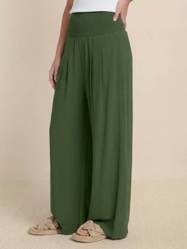Comfortable women's high waist wide leg pants with a trendy smocked waistband, spring fashion.