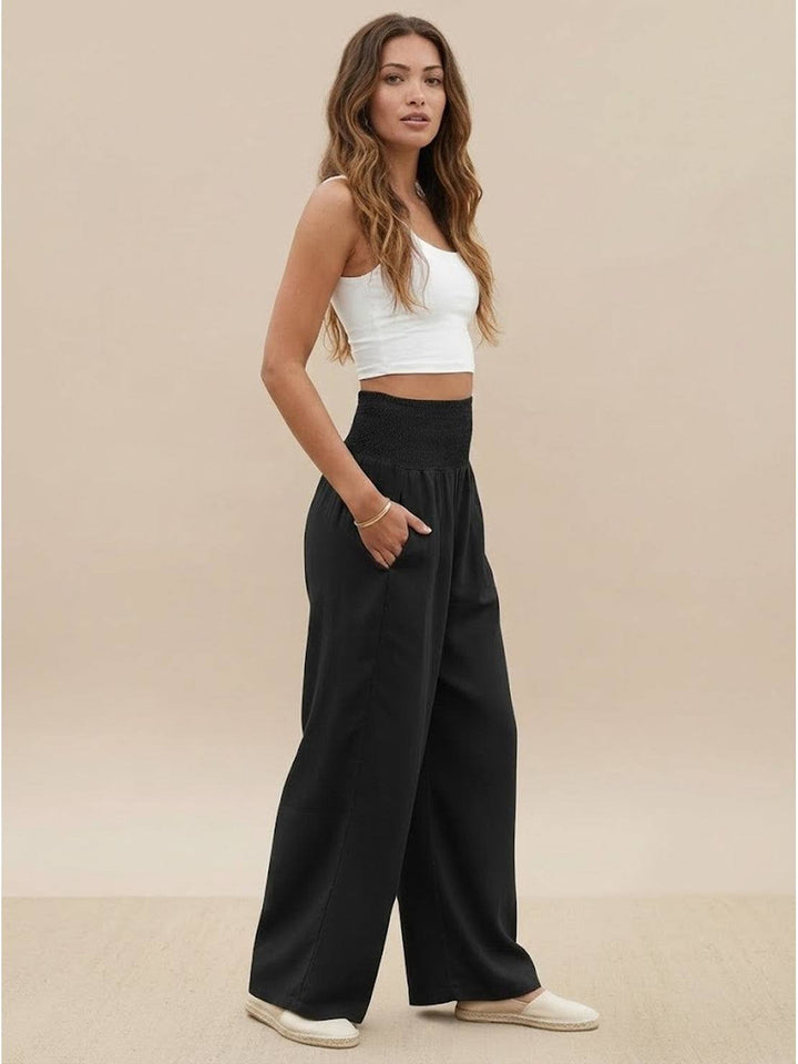 High waist wide leg smocked trousers, women's versatile relaxed fit for day or night.