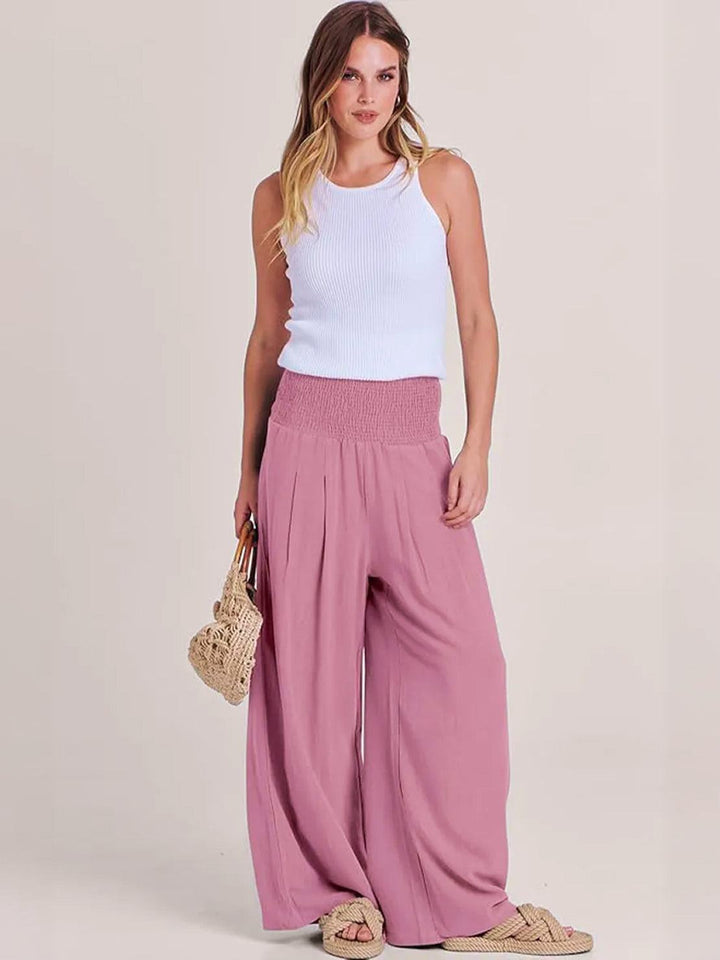 Spring fashion women's wide leg trousers, high waist & smocked, comfortable pull-on design.