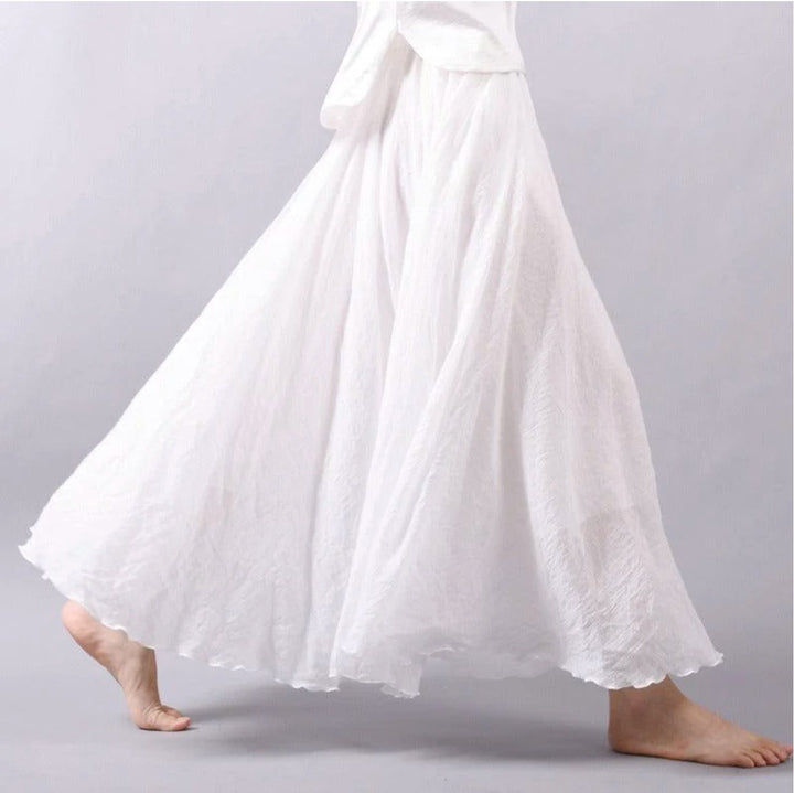Stylish women's A-line maxi skirt with a high waist, long and flowing, ideal for a bohemian summer look.