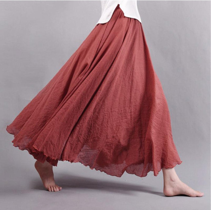 Long flowing women's high-waist maxi skirt, A-line bohemian style, perfect for summer beach or casual look.