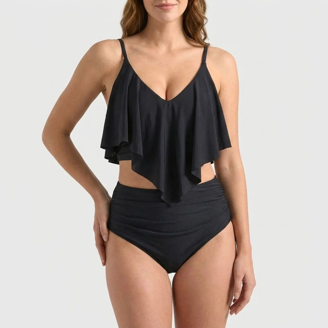 Flattering women's high-waisted ruffle two-piece bikini for stylish beach and poolside wear.