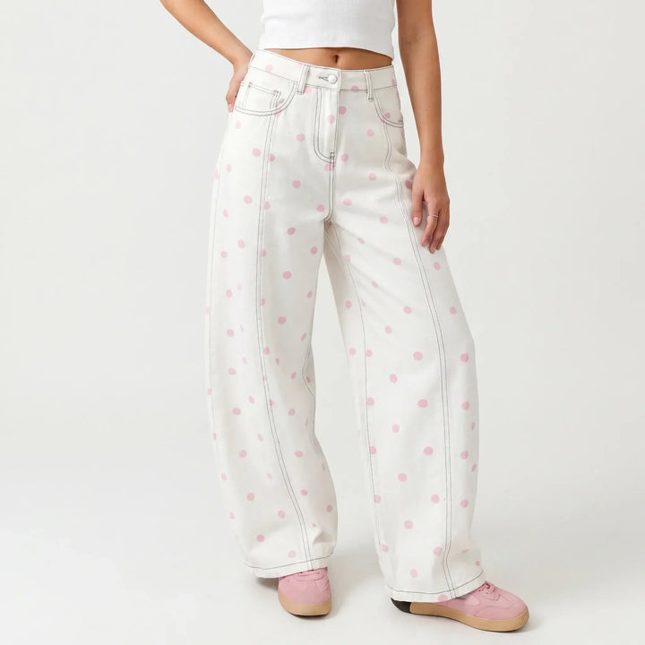 Fashionable high-waisted barrel pants for women, featuring a trendy dotted design and relaxed fit.