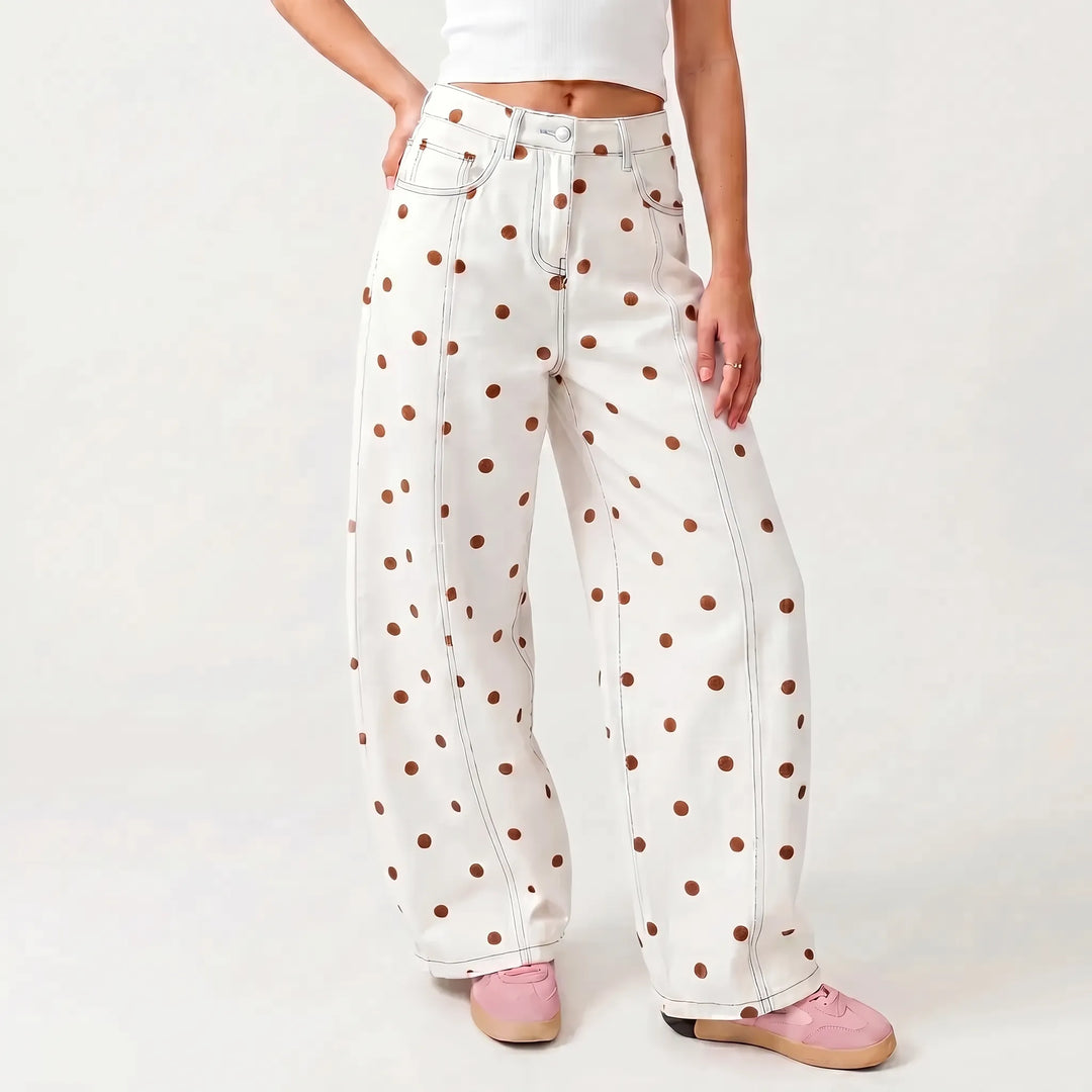 Model showcasing women's high-waisted barrel pants with polka dots, a stylish and comfy casual option.