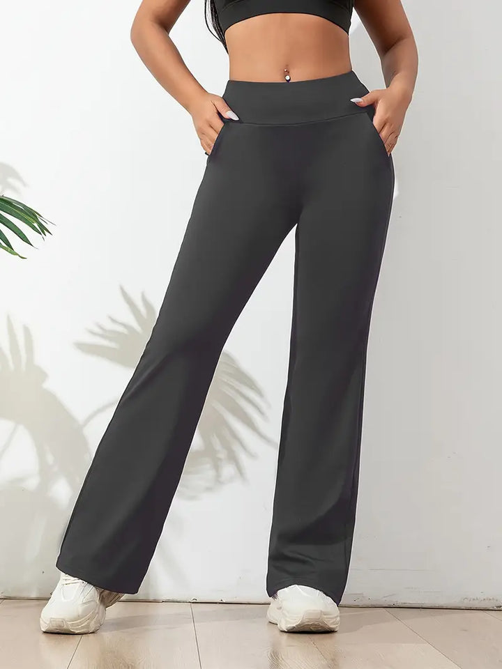 Stylish women's high-waisted flared yoga pants. Ideal for activewear, workouts, and everyday comfort and style.