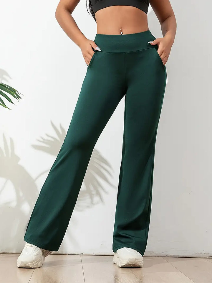 Versatile women's high-waisted flared activewear pants. Combines comfort & style for gym, yoga, or daily casual.