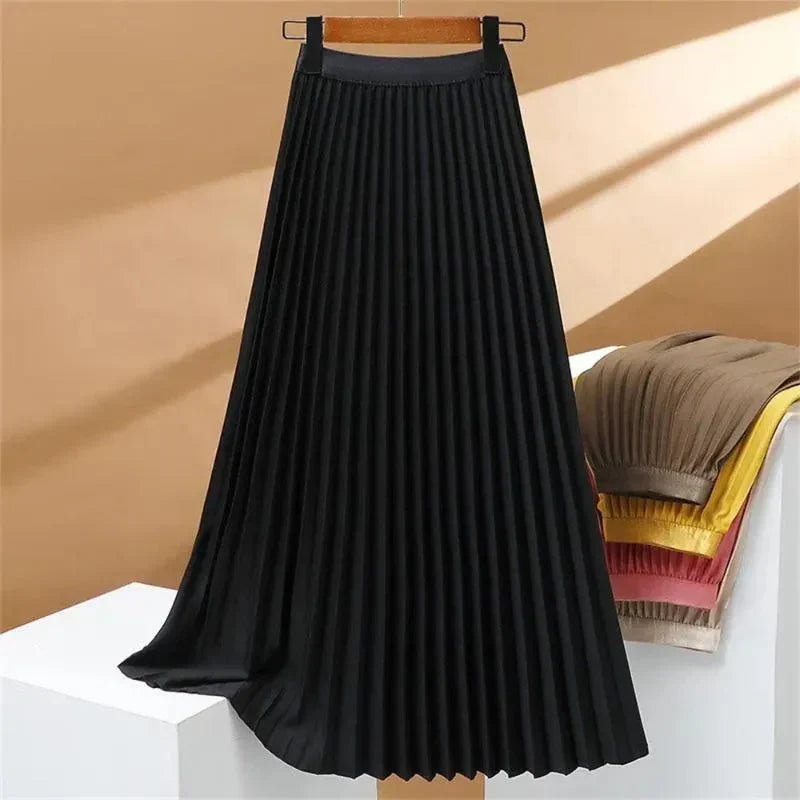 Flowy women's high-waisted pleated maxi skirt, showcasing its elegant drape and comfortable fit.