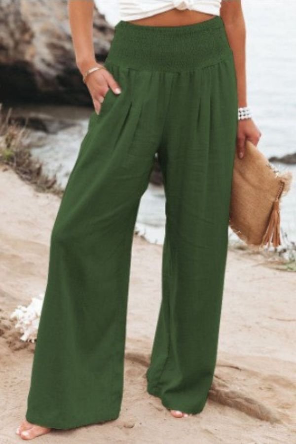 Stylish women's wide leg linen palazzo pants, featuring a flattering high and smocked waist.