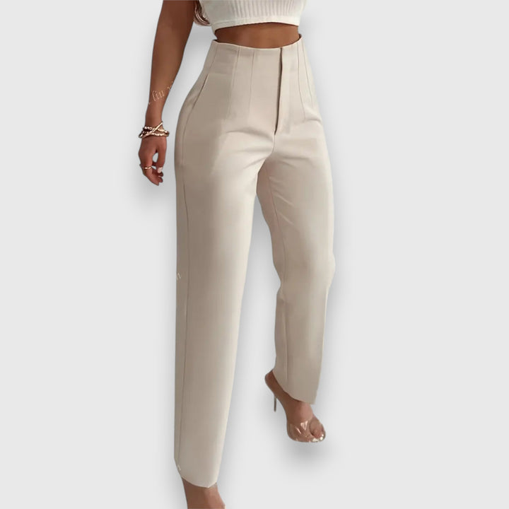 Women's high-waisted straight leg dress pants. Tailored for professional office wear. Effortless style for work.