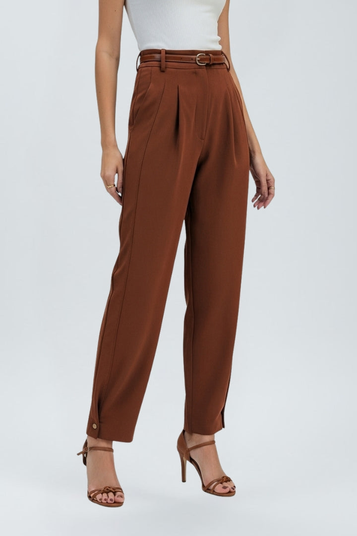 Women's high-waisted tapered trousers with a chic belt. Flattering and comfortable dress pants for various occasions.