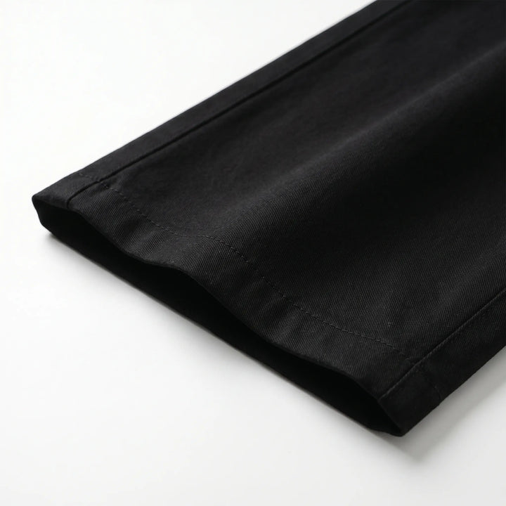 Full-length women's black high-waisted wide-leg pants, offering comfort and a modern silhouette.