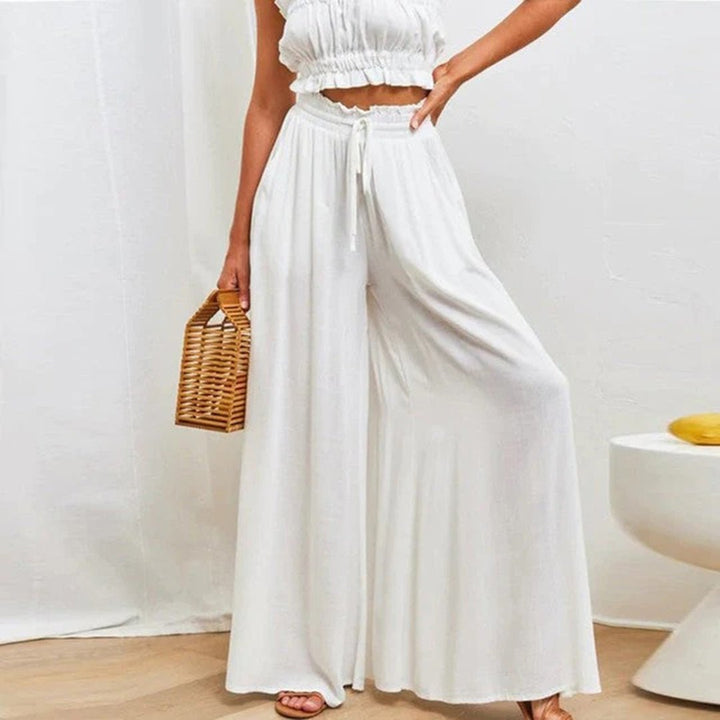 Women's high waisted wide leg palazzo pants with a comfortable flowy fit.