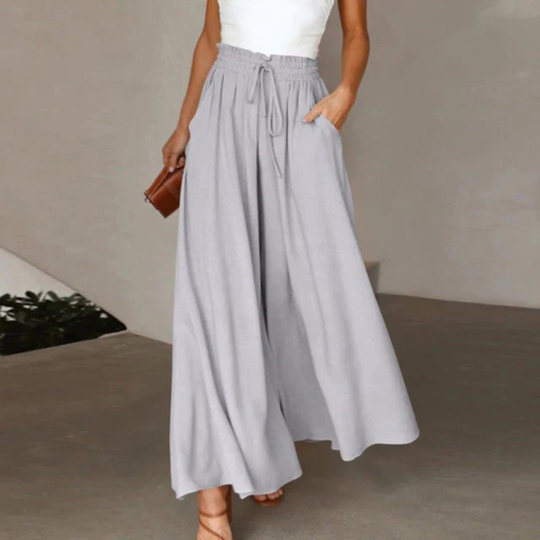 Flowy wide leg palazzo pants, high waisted, ideal for women seeking casual comfort.