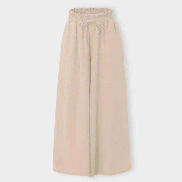 High waisted wide leg palazzo pants for women, offering a comfortable and flowy fit with drawstring waist.