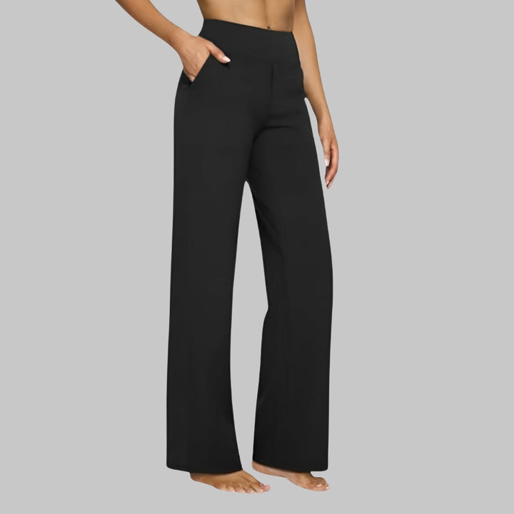 Modern women's high-waisted wide-leg pants with side pockets, suitable for casual outings.