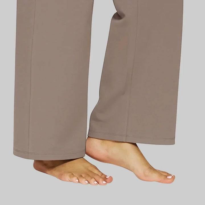 Relaxed fit women's pants with a high waist and wide leg, promoting ultimate comfort.