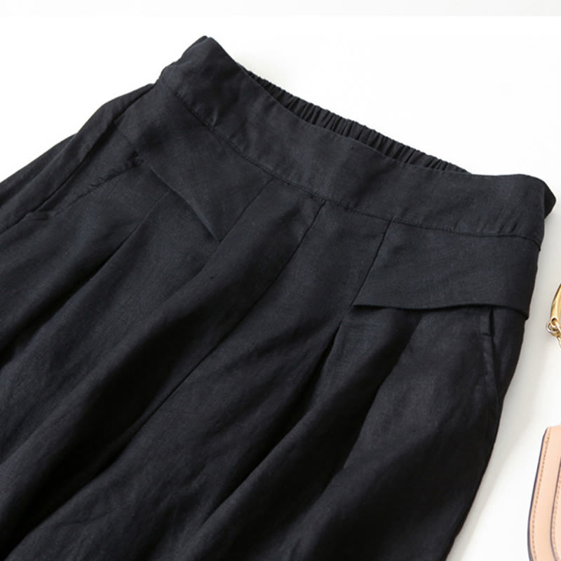 Versatile women's wide-leg pants, high-waisted and relaxed for a chic, comfortable style.