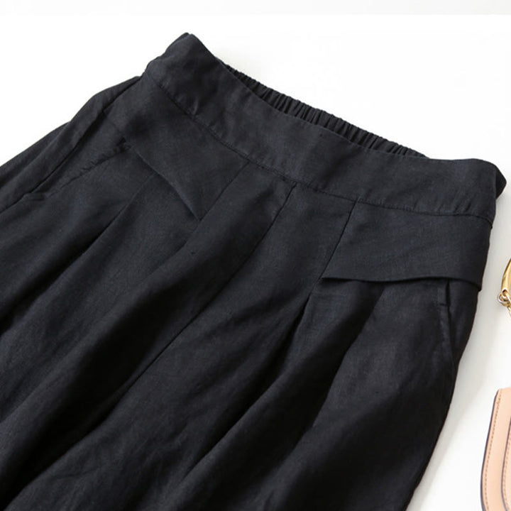 Versatile women's wide-leg pants, high-waisted and relaxed for a chic, comfortable style.