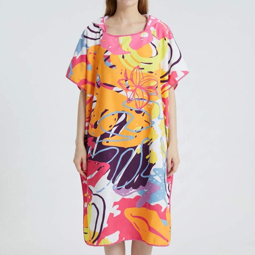 Quick-dry women's hooded beach poncho for pool or travel. Soft, absorbent swim cover-up and changing robe.