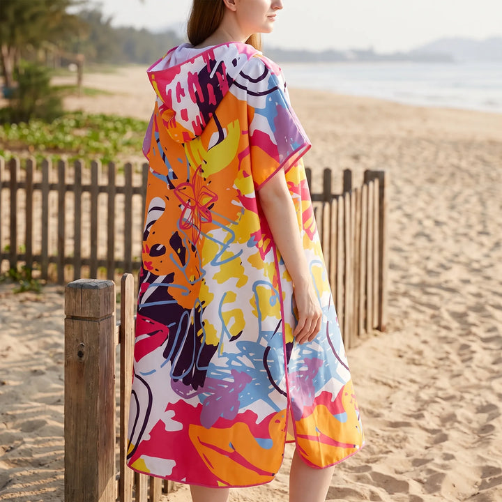 Stylish abstract print women's hooded towel poncho. Absorbent & quick-dry changing robe, ideal for beach or pool.