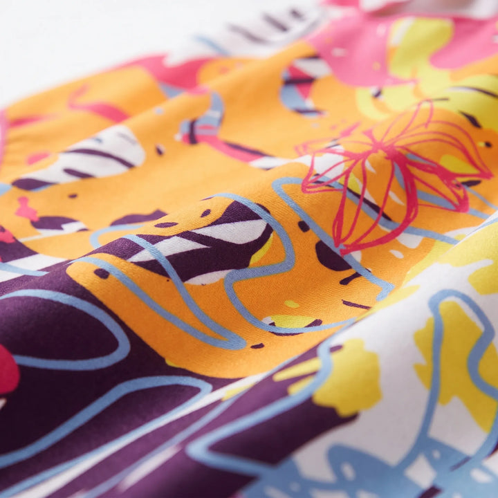 Women's quick-dry hooded beach towel poncho. Versatile swim cover-up, changing robe, and pool accessory. Abstract print.