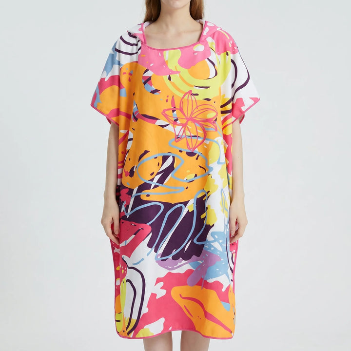 Stay dry & warm with this women's quick-dry hooded beach poncho. Abstract print swim cover-up and changing robe.