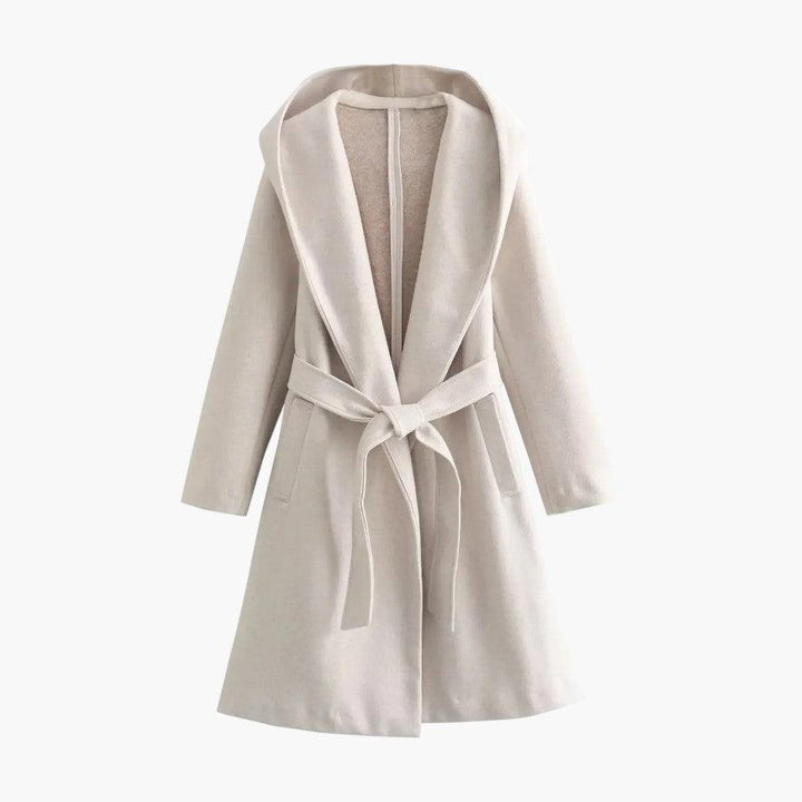 Side profile of a women's hooded belted trench coat, a stylish and weather-ready ladies' outerwear.