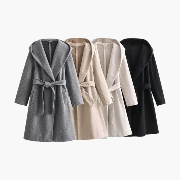 Elegant women's hooded belted trench coat, a chic and weather-ready outerwear piece for stylish ladies.