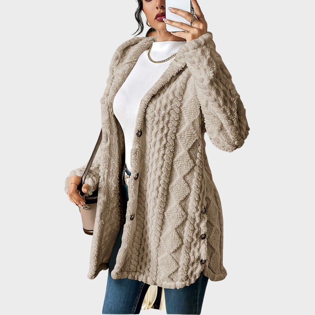 Elegant women's hooded long coat with button front. Versatile fall fashion jacket for chic winter style.