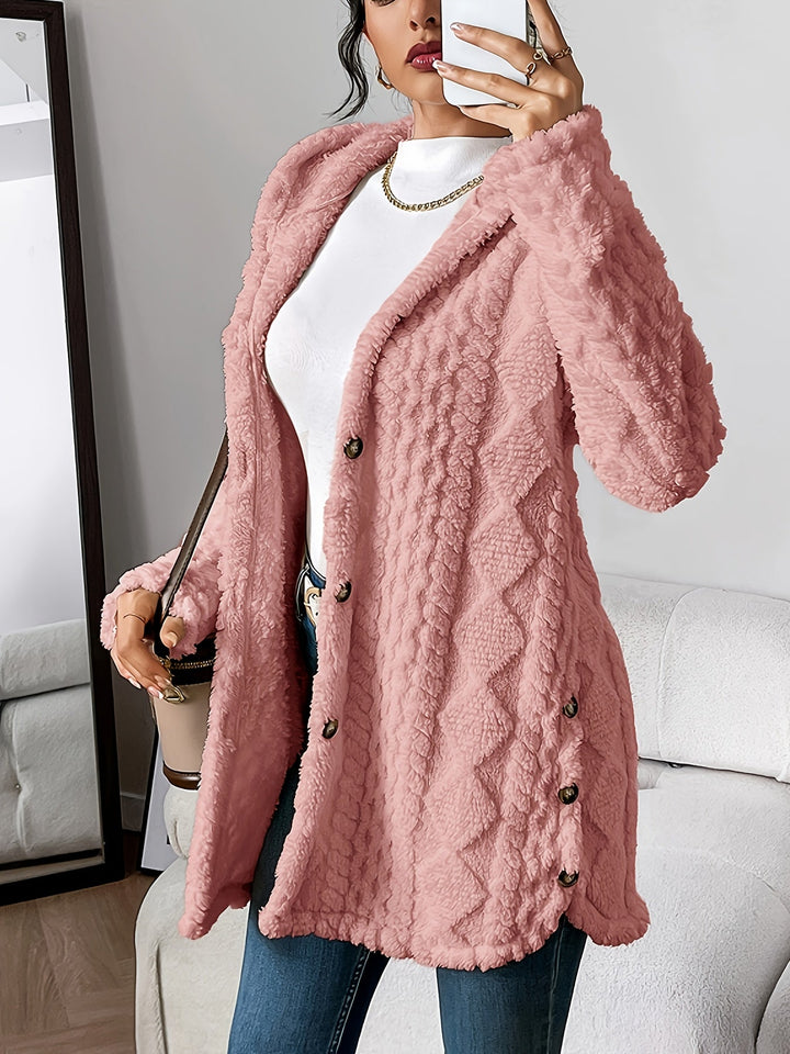 Fashionable women's long hooded coat. Button-front outerwear jacket, ideal for chic fall & winter style.
