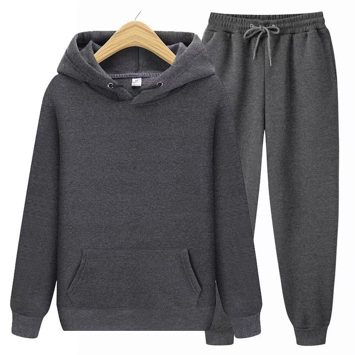 Fashionable women's jogger set with a hooded sweatshirt, great for home or casual outings.