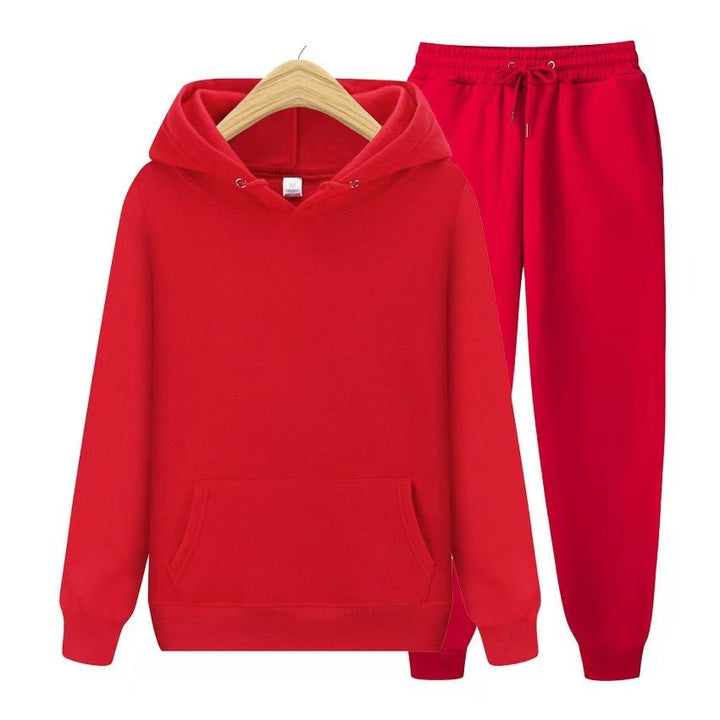Front view of women's hooded sweatshirt and jogger pants set, emphasizing the relaxed fit.