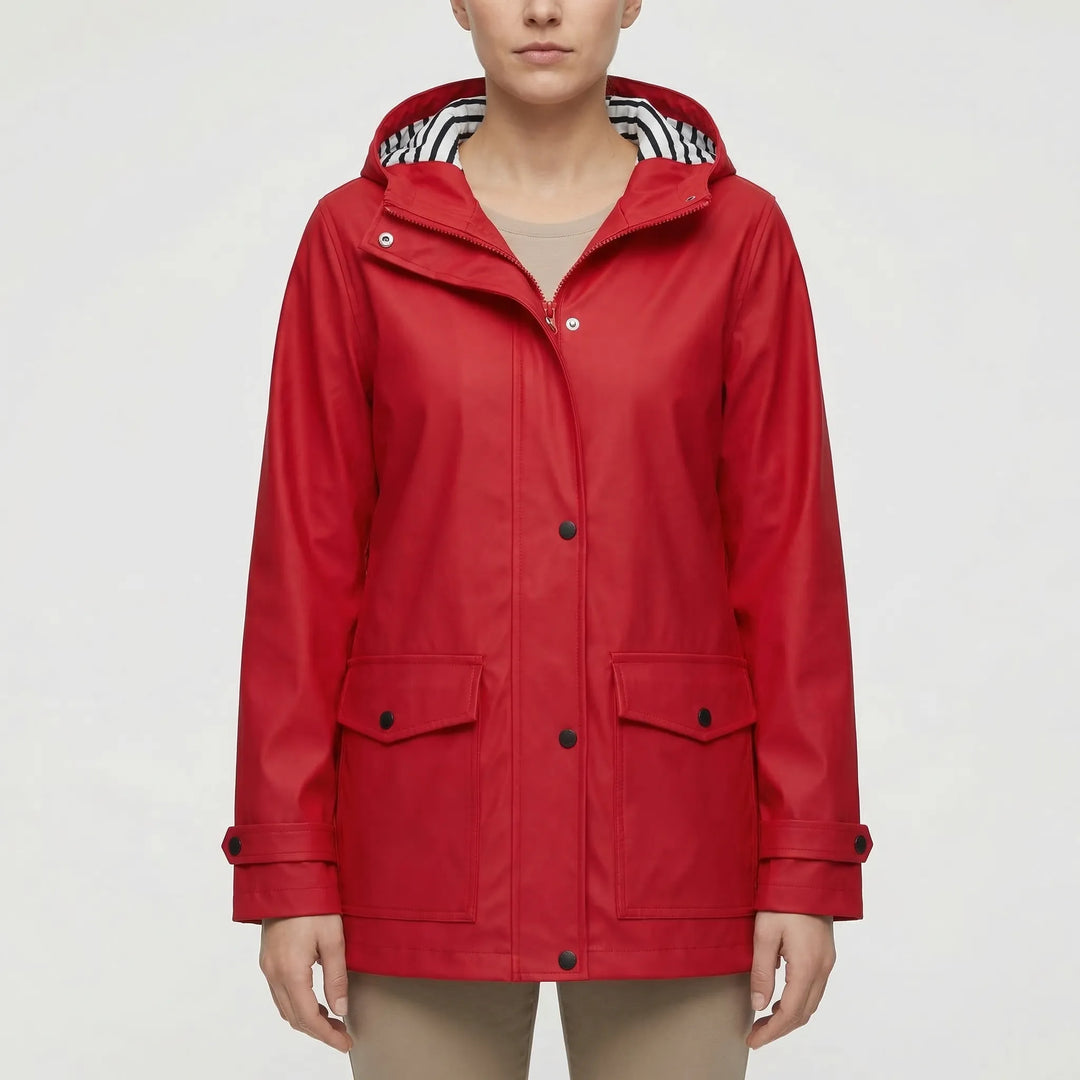 Lightweight women's outdoor jacket, easily packable and hooded, ideal for spring hiking & travel.