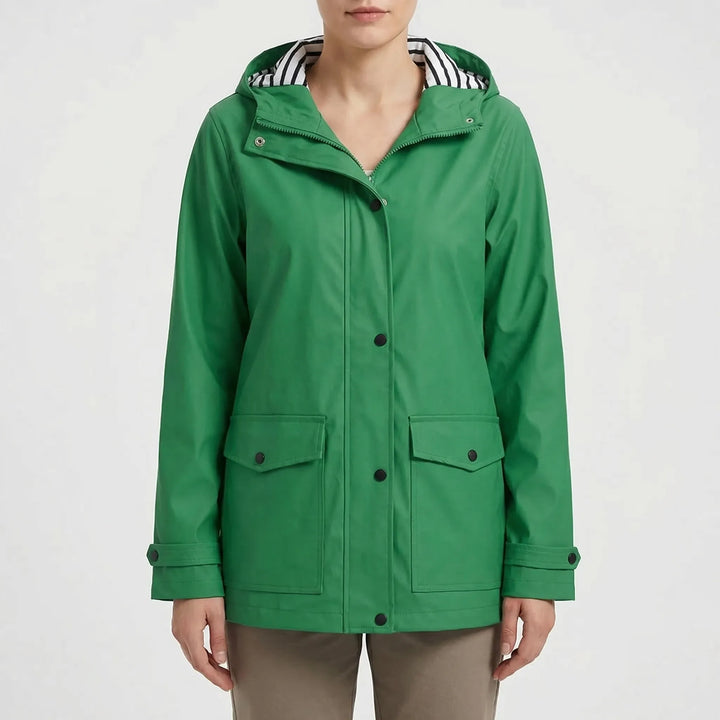Detail of sealed seams & breathable lining in a women's waterproof hiking jacket, ensuring dry comfort.