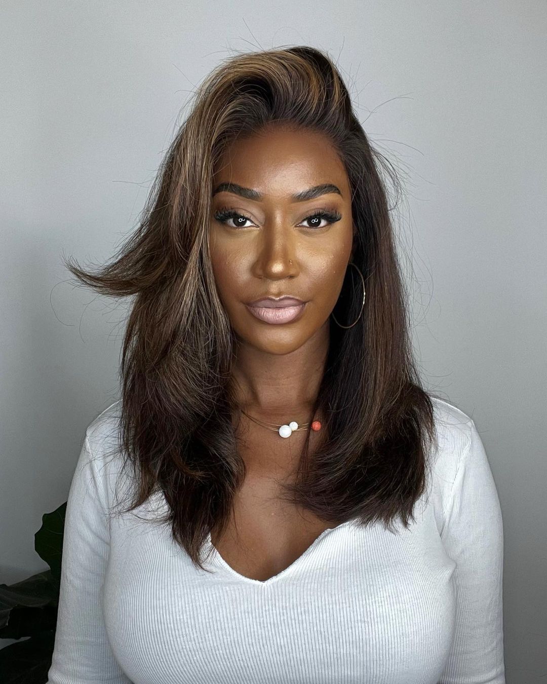 Realistic human hair lace front wig for women, natural blonde highlights, wavy style & secure fit.