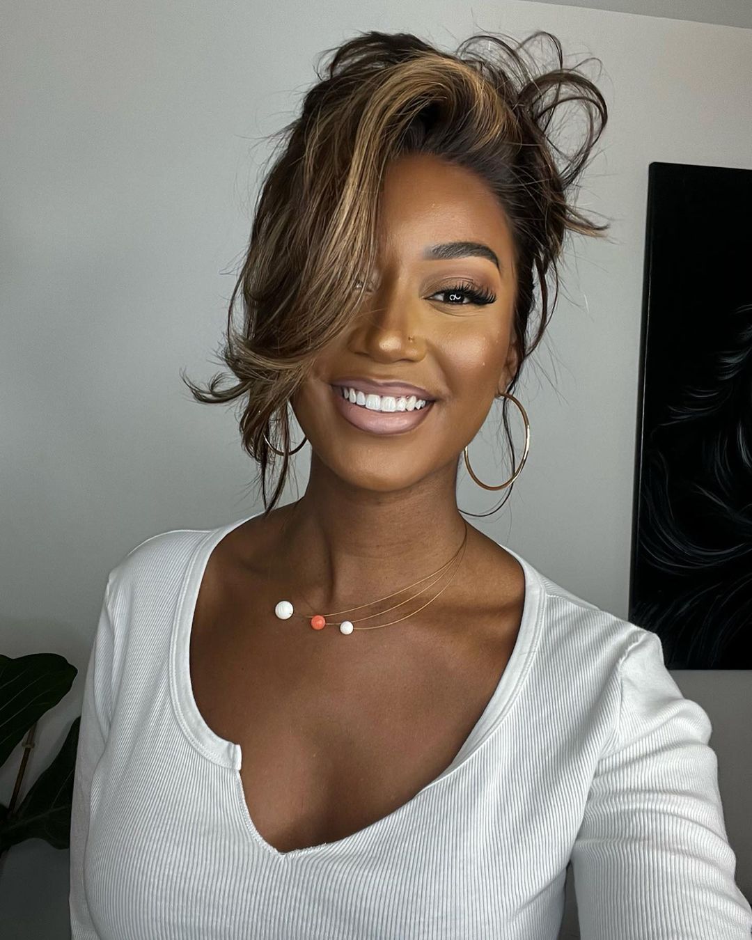 Highlighted human hair lace front wig for women, blonde highlights, natural wavy style, premium quality.