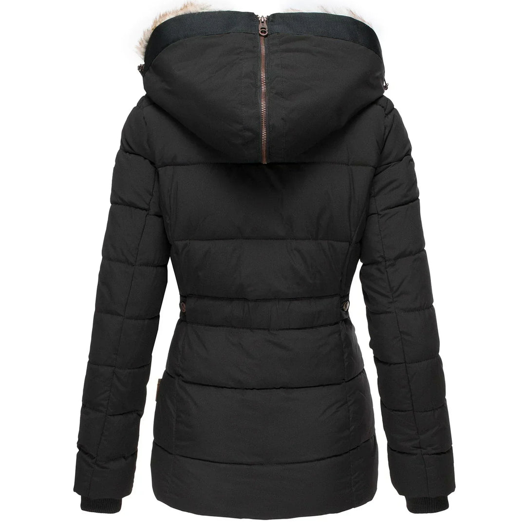 Stylish women's hooded winter jacket, insulated for warmth, ideal outerwear for cold weather.