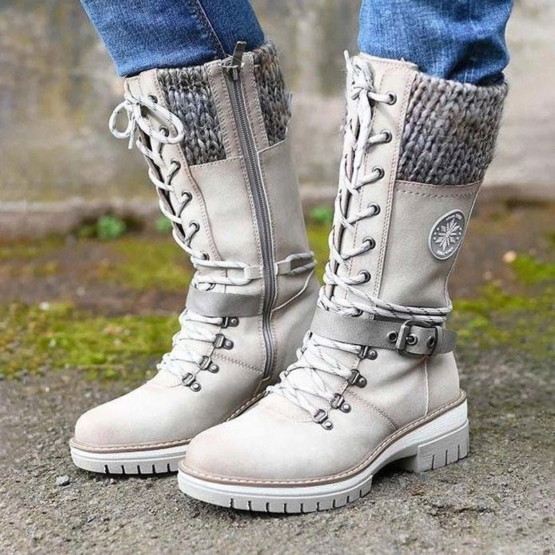 Women's insulated waterproof winter boots, black, cozy & non-slip for outdoor wear.