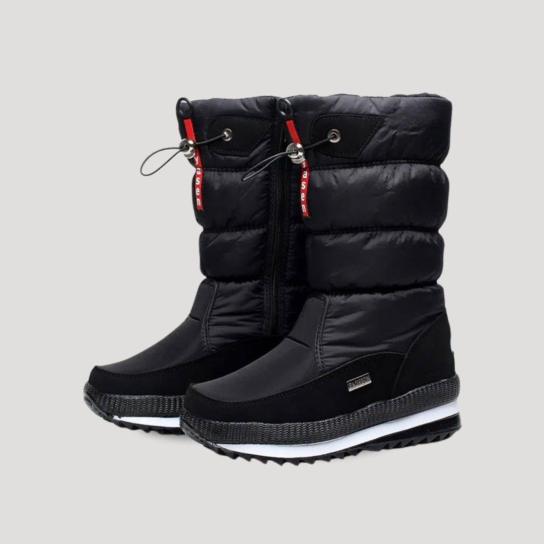 Women's insulated waterproof winter boots for extreme cold, featuring slip-resistant sole & comfortable fit.