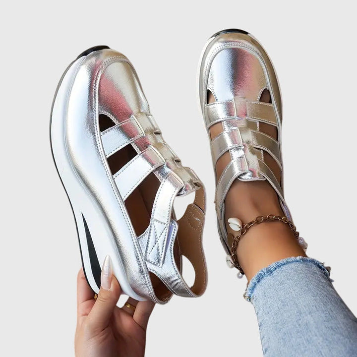 Women's Judy orthopedic sandals, featuring adjustable arch support for comfortable relief during summer walks.
