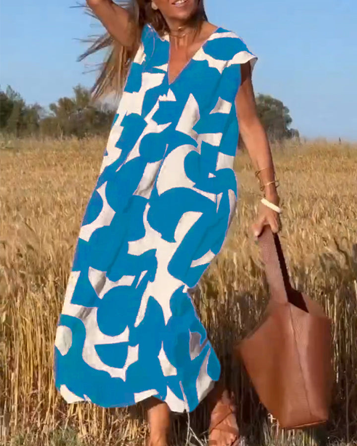 Stylish women's Kendall dress, abstract print, relaxed fit, perfect for casual summer fashion.