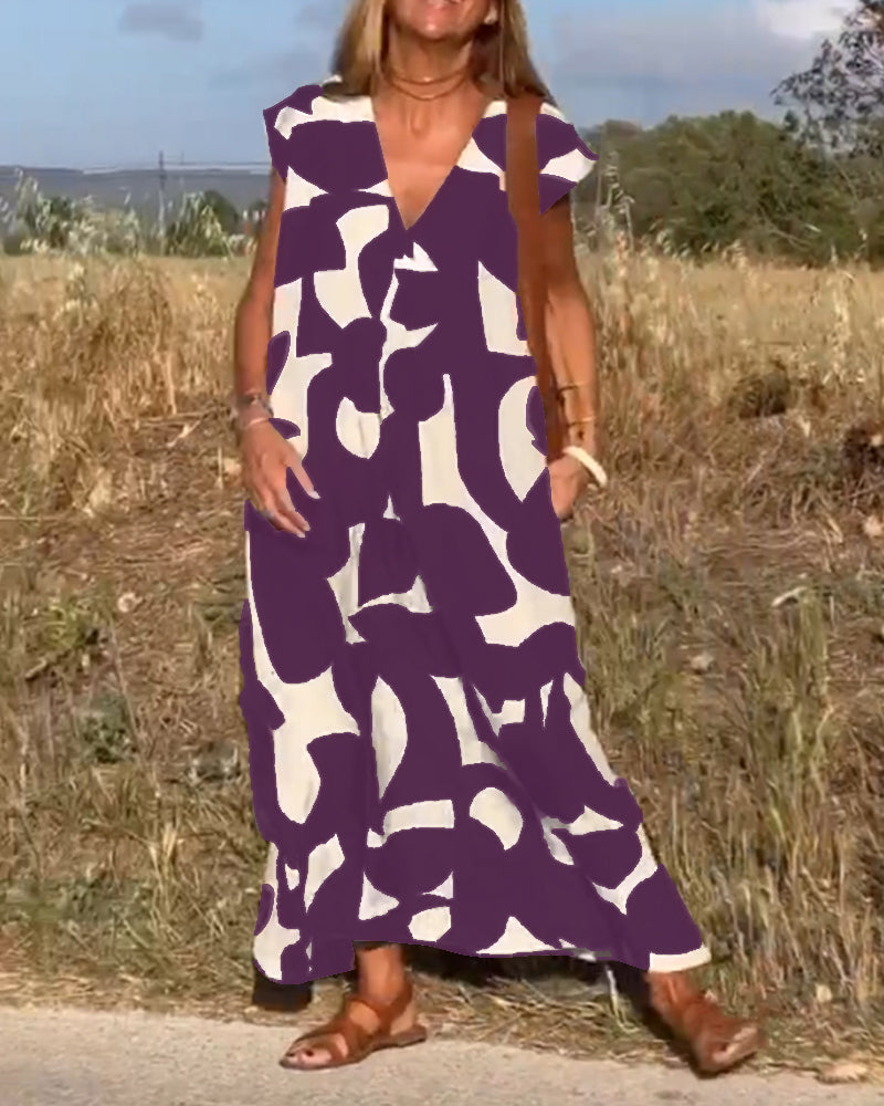 Chic ladies' abstract print dress, V-neck cap sleeve style, suitable for casual & vacation.