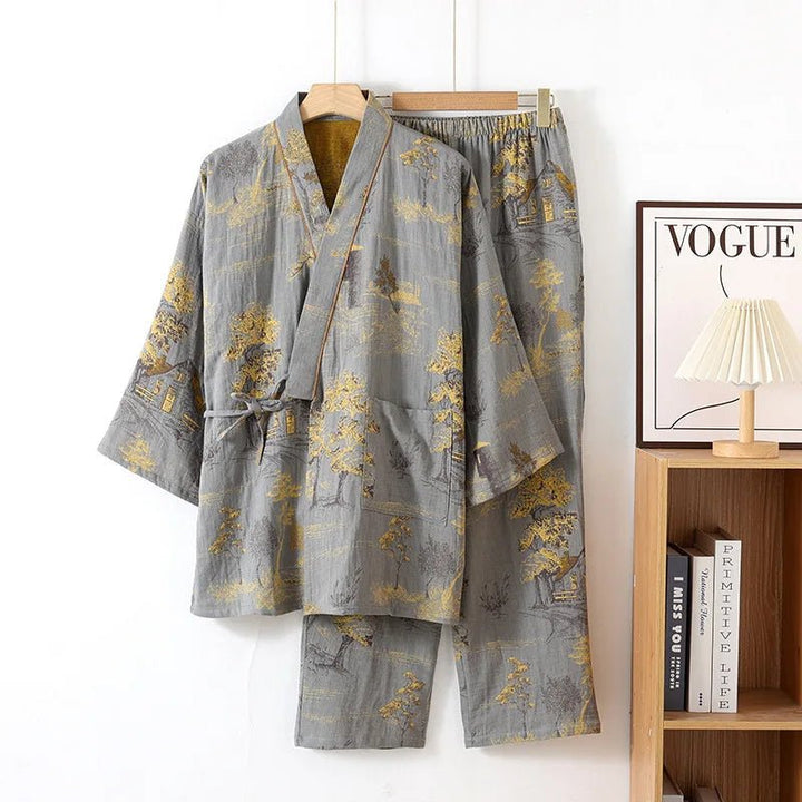 Elegant women's kimono style pajama set featuring a vibrant artistic watercolor print. Perfect for lounging.