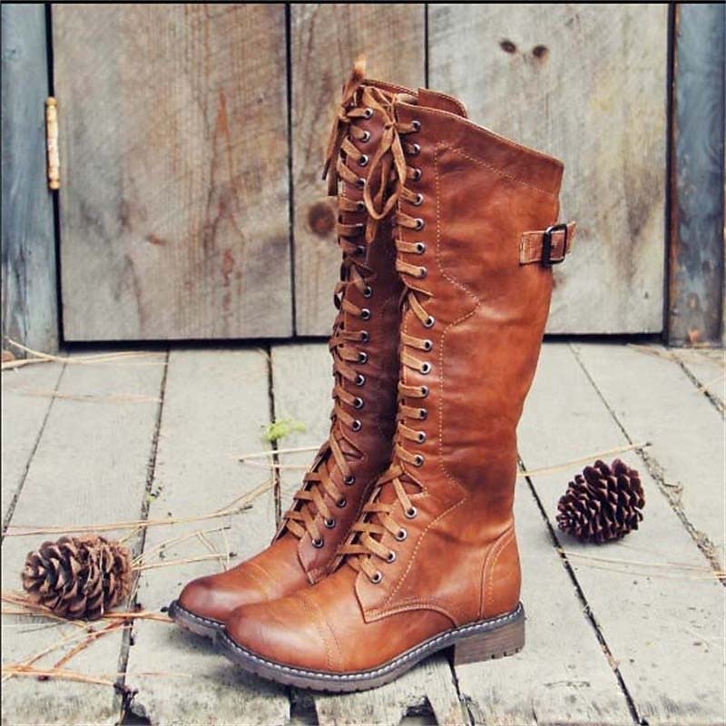 Women's knee-high lace-up riding boots for casual everyday wear. Comfortable and stylish fall/winter footwear.